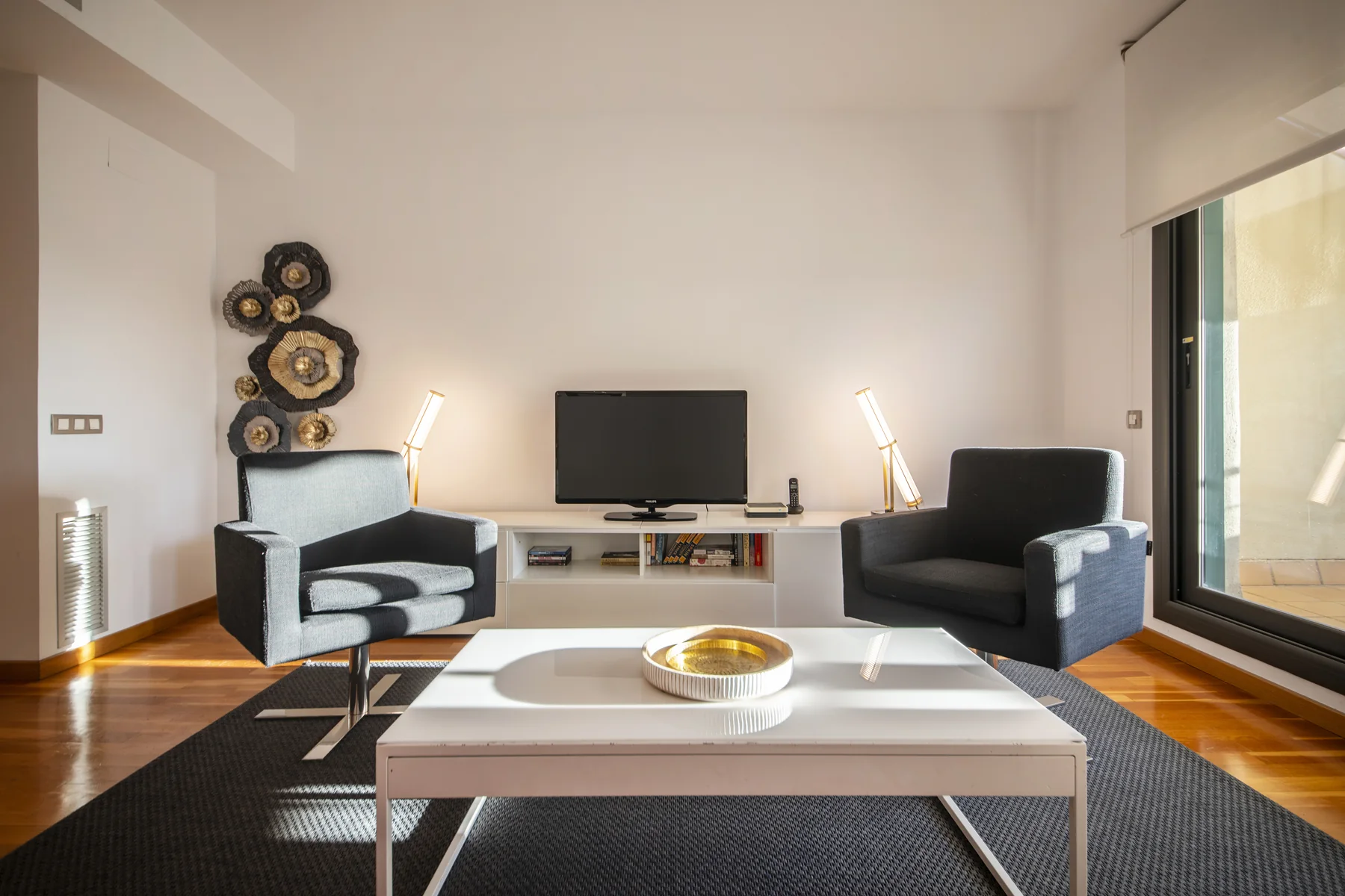Suite Divina televisió i sillons